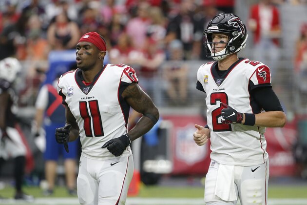 Atlanta Falcons quarterback Matt Ryan (2) and Julio Jones (11) during an NFL football game against the Arizona Cardinals, Sunday, Oct. 13, 2019, in Glendale, Ariz. (AP Photo/Rick Scuteri)