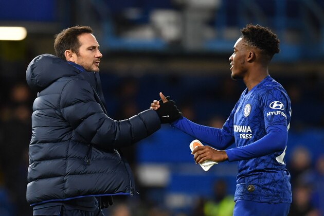 Chelsea's English midfielder Callum Hudson-Odoi (R) and Chelsea's English head coach Frank Lampard react at the final whistle during the English Premier League football match between Chelsea and Burnley at Stamford Bridge in London on January 11, 2020. (Photo by Ben STANSALL / AFP) / RESTRICTED TO EDITORIAL USE. No use with unauthorized audio, video, data, fixture lists, club/league logos or 'live' services. Online in-match use limited to 120 images. An additional 40 images may be used in extra time. No video emulation. Social media in-match use limited to 120 images. An additional 40 images may be used in extra time. No use in betting publications, games or single club/league/player publications. /  (Photo by BEN STANSALL/AFP via Getty Images)