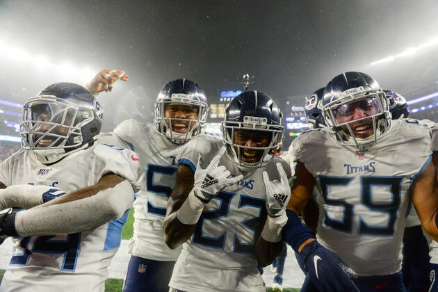 FOXBOROUGH, MASSACHUSETTS - JANUARY 04: Logan Ryan #26 of the Tennessee Titans celebrates his touchdown with teammates against the New England Patriots in the fourth quarter of the AFC Wild Card Playoff game at Gillette Stadium on January 04, 2020 in Foxborough, Massachusetts. (Photo by Kathryn Riley/Getty Images)