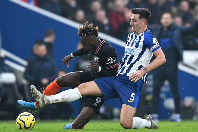 Chelsea's English striker Tammy Abraham (L) is tackled by Brighton's English defender Lewis Dunk during the English Premier League football match between Brighton and Hove Albion and Chelsea at the American Express Community Stadium in Brighton, southern England on January 1, 2020. (Photo by Glyn KIRK / AFP) / RESTRICTED TO EDITORIAL USE. No use with unauthorized audio, video, data, fixture lists, club/league logos or 'live' services. Online in-match use limited to 120 images. An additional 40 images may be used in extra time. No video emulation. Social media in-match use limited to 120 images. An additional 40 images may be used in extra time. No use in betting publications, games or single club/league/player publications. / (Photo by GLYN KIRK/AFP via Getty Images) Chelsea's English striker Tammy Abraham (L) is tackled by Brighton's English defender Lewis Dunk during the English Premier League football match between Brighton and Hove Albion and Chelsea at the American Express Community Stadium in Brighton, southern England on January 1, 2020. (Photo by Glyn KIRK / AFP) / RESTRICTED TO EDITORIAL USE. No use with unauthorized audio, video, data, fixture lists, club/league logos or 'live' services. Online in-match use limited to 120 images. An additional 40 images may be used in extra time. No video emulation. Social media in-match use limited to 120 images. An additional 40 images may be used in extra time. No use in betting publications, games or single club/league/player publications. / (Photo by GLYN KIRK/AFP via Getty Images)