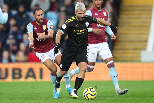 BIRMINGHAM, ENGLAND - JANUARY 12: Sergio Aguero of Manchester City beats Ahmed El Mohamady of Aston Villa on his way to scoring his second goal and their fifth during the Premier League match between Aston Villa and Manchester City at Villa Park on January 12, 2020 in Birmingham, United Kingdom. (Photo by Alex Livesey - Danehouse/Getty Images) BIRMINGHAM, ENGLAND - JANUARY 12: Sergio Aguero of Manchester City beats Ahmed El Mohamady of Aston Villa on his way to scoring his second goal and their fifth during the Premier League match between Aston Villa and Manchester City at Villa Park on January 12, 2020 in Birmingham, United Kingdom. (Photo by Alex Livesey - Danehouse/Getty Images)