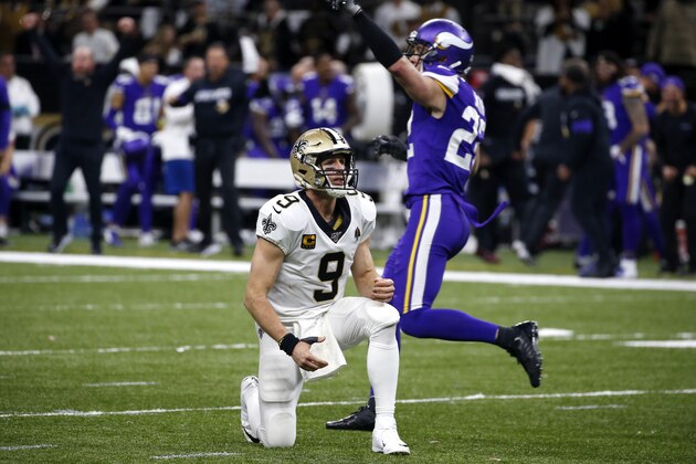 New Orleans Saints quarterback Drew Brees (9) reacts as Minnesota Vikings free safety Harrison Smith (22) celebrates after Brees fumbled, turning over the ball in field goal range, in the second half of an NFL wild-card playoff football game, Sunday, Jan. 5, 2020, in New Orleans. (AP Photo/Butch Dill)