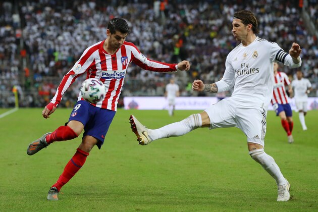 JEDDAH, SAUDI ARABIA - JANUARY 12: Alvaro Morata of Atletico Madrid battles for possession with Sergio Ramos of Real Madrid  during the Supercopa de Espana Final match between Real Madrid and Club Atletico de Madrid at King Abdullah Sports City on January 12, 2020 in Jeddah, Saudi Arabia. (Photo by Francois Nel/Getty Images)