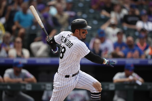 Colorado Rockies third baseman Nolan Arenado (28) in the third inning of a baseball game Wednesday, Sept. 18, 2019, in Denver. (AP Photo/David Zalubowski)