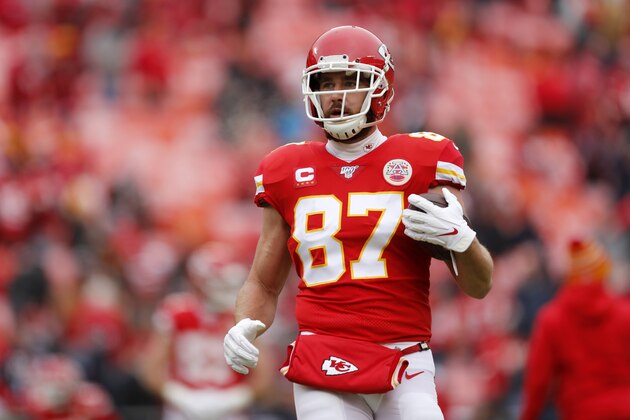 Kansas City Chiefs tight end Travis Kelce (87) warms up before an NFL divisional playoff football game against the Houston Texans, in Kansas City, Mo., Sunday, Jan. 12, 2020. (AP Photo/Jeff Roberson)