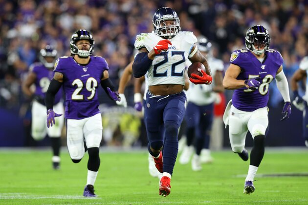 BALTIMORE, MARYLAND - JANUARY 11: Running back Derrick Henry #22 of the Tennessee Titans carries the ball against the Baltimore Ravens during the AFC Divisional Playoff game at M&T Bank Stadium on January 11, 2020 in Baltimore, Maryland. (Photo by Rob Carr/Getty Images)