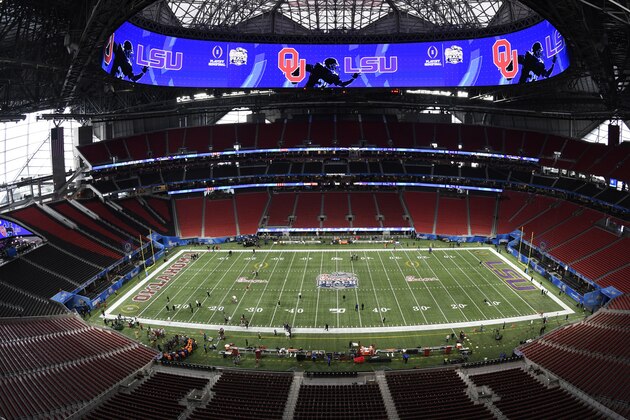 The Mercedes Benz stadium is prepared before the first half of the Peach Bowl NCAA semifinal college football playoff game between LSU and Oklahoma, Saturday, Dec. 28, 2019, in Atlanta. (AP Photo/Danny Karnik)