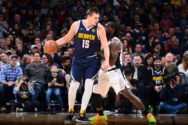 DENVER, CO - JANUARY 12: Nikola Jokic #15 of the Denver Nuggets handles the ball during the game against the LA Clippers on January 12, 2020 at the Pepsi Center in Denver, Colorado. NOTE TO USER: User expressly acknowledges and agrees that, by downloading and/or using this Photograph, user is consenting to the terms and conditions of the Getty Images License Agreement. Mandatory Copyright Notice: Copyright 2020 NBAE (Photo by Bart Young/NBAE via Getty Images)