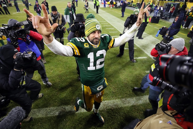 GREEN BAY, WISCONSIN - JANUARY 12: Aaron Rodgers #12 of the Green Bay Packers celebrates after defeating the Seattle Seahawks 28-23 in the NFC Divisional Playoff game at Lambeau Field on January 12, 2020 in Green Bay, Wisconsin. (Photo by Gregory Shamus/Getty Images)