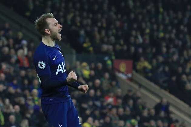 Tottenham Hotspur's Danish midfielder Christian Eriksen celebrates scoring their first goal to equalise 1-1 during the English Premier League football match between Norwich City and Tottenham Hotspur at Carrow Road in Norwich, eastern England on December 28, 2019. (Photo by Lindsey Parnaby / AFP) / RESTRICTED TO EDITORIAL USE. No use with unauthorized audio, video, data, fixture lists, club/league logos or 'live' services. Online in-match use limited to 120 images. An additional 40 images may be used in extra time. No video emulation. Social media in-match use limited to 120 images. An additional 40 images may be used in extra time. No use in betting publications, games or single club/league/player publications. /  (Photo by LINDSEY PARNABY/AFP via Getty Images)