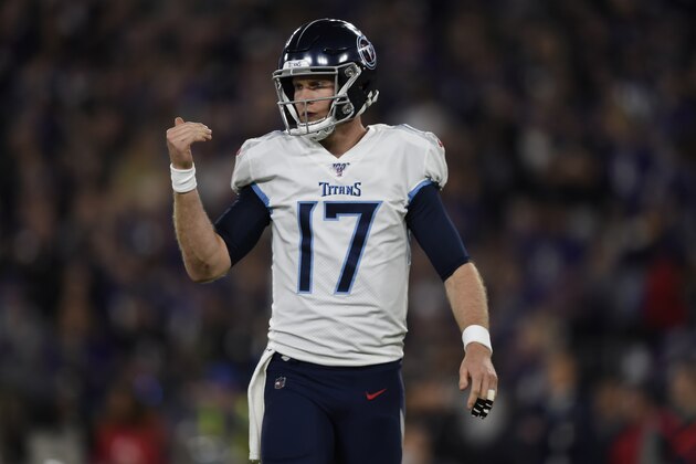 Tennessee Titans quarterback Ryan Tannehill (17) works against the Baltimore Ravens during the first half an NFL divisional playoff football game, Saturday, Jan. 11, 2020, in Baltimore. (AP Photo/Gail Burton)