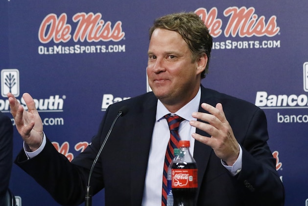 Lane Kiffin responds to reporters questions at a news conference, after being introduced to Mississippi fans as their new NCAA college football coach, at The Pavilion, a multipurpose arena on the campus in Oxford, Miss., Monday, Dec. 9, 2019. Kiffin was previously, the football coach for three years at Florida Atlantic. (AP Photo/Rogelio V. Solis)