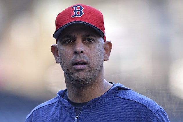 Boston Red Sox' Alex Cora looks on before the baseball game against the San Diego Padres Friday, Aug. 23, 2019, in San Diego. (AP Photo/Orlando Ramirez)