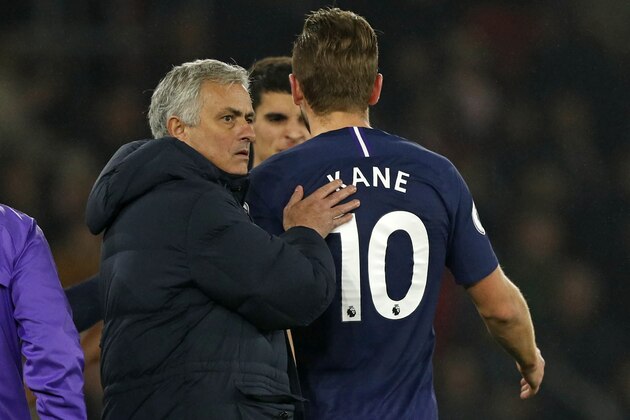 Tottenham Hotspur's Portuguese head coach Jose Mourinho (L) consoles Tottenham Hotspur's English striker Harry Kane (R) as he leaves the pitch having picked up an injury during the English Premier League football match between Southampton and Tottenham at St Mary's Stadium in Southampton, southern England on January 1, 2020. (Photo by Adrian DENNIS / AFP) / RESTRICTED TO EDITORIAL USE. No use with unauthorized audio, video, data, fixture lists, club/league logos or 'live' services. Online in-match use limited to 120 images. An additional 40 images may be used in extra time. No video emulation. Social media in-match use limited to 120 images. An additional 40 images may be used in extra time. No use in betting publications, games or single club/league/player publications. /  (Photo by ADRIAN DENNIS/AFP via Getty Images)