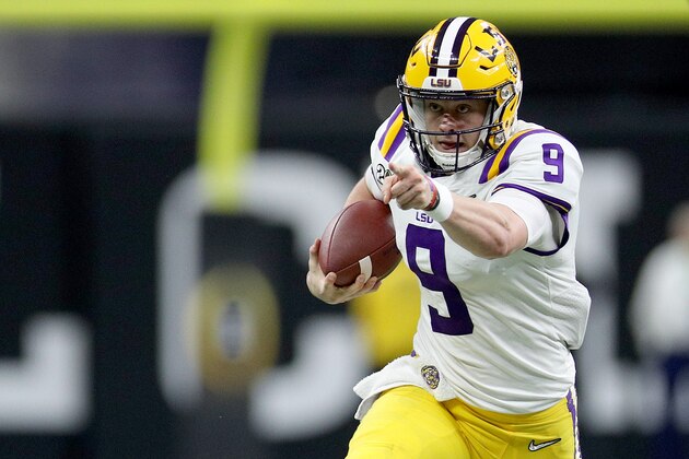NEW ORLEANS, LOUISIANA - JANUARY 13: Joe Burrow #9 of the LSU Tigers runs the ball against the Clemson Tigers during the College Football Playoff National Championship game at Mercedes Benz Superdome on January 13, 2020 in New Orleans, Louisiana. (Photo by Chris Graythen/Getty Images)
