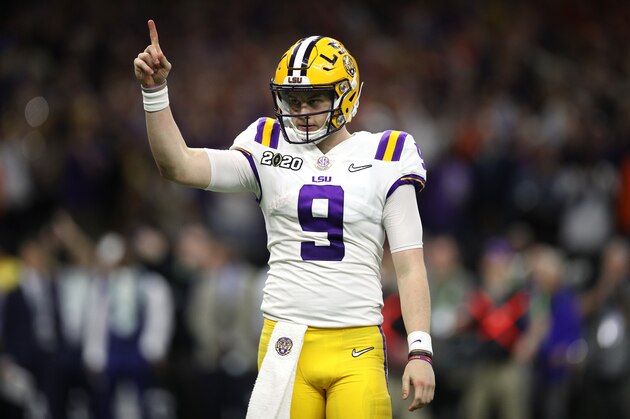 NEW ORLEANS, LOUISIANA - JANUARY 13: Joe Burrow #9 of the LSU Tigers reacts to a touchdown against Clemson Tigers during the third quarter in the College Football Playoff National Championship game at Mercedes Benz Superdome on January 13, 2020 in New Orleans, Louisiana. (Photo by Chris Graythen/Getty Images)