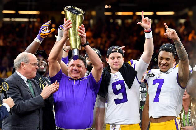NEW ORLEANS, LOUISIANA - JANUARY 13: Head coach Ed Orgeron of the LSU Tigers raises the National Championship Trophy with Joe Burrow #9 and Grant Delpit #7 after the College Football Playoff National Championship game at the Mercedes Benz Superdome on January 13, 2020 in New Orleans, Louisiana. The LSU Tigers topped the Clemson Tigers, 42-25. (Photo by Alika Jenner/Getty Images) NEW ORLEANS, LOUISIANA - JANUARY 13: Head coach Ed Orgeron of the LSU Tigers raises the National Championship Trophy with Joe Burrow #9 and Grant Delpit #7 after the College Football Playoff National Championship game at the Mercedes Benz Superdome on January 13, 2020 in New Orleans, Louisiana. The LSU Tigers topped the Clemson Tigers, 42-25. (Photo by Alika Jenner/Getty Images)