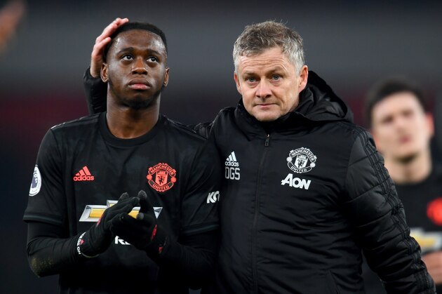 LONDON, ENGLAND - JANUARY 01: Ole Gunnar Solskjaer, Manager of Manchester United speaks to Aaron Wan-Bissaka of Manchester United after the Premier League match between Arsenal FC and Manchester United at Emirates Stadium on January 01, 2020 in London, United Kingdom. (Photo by Clive Mason/Getty Images) LONDON, ENGLAND - JANUARY 01: Ole Gunnar Solskjaer, Manager of Manchester United speaks to Aaron Wan-Bissaka of Manchester United after the Premier League match between Arsenal FC and Manchester United at Emirates Stadium on January 01, 2020 in London, United Kingdom. (Photo by Clive Mason/Getty Images)