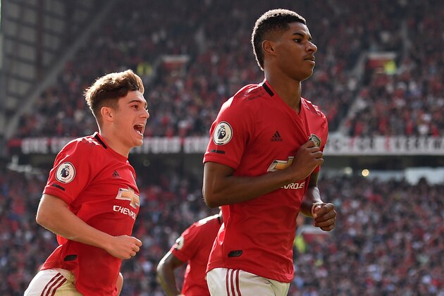 Manchester United's English striker Marcus Rashford (R) celebrates with Manchester United's Welsh midfielder Daniel James (L) after scoring the opening goal of the English Premier League football match between Manchester United and Leicester City at Old Trafford in Manchester, north west England, on September 14, 2019. (Photo by Oli SCARFF / AFP) / RESTRICTED TO EDITORIAL USE. No use with unauthorized audio, video, data, fixture lists, club/league logos or 'live' services. Online in-match use limited to 120 images. An additional 40 images may be used in extra time. No video emulation. Social media in-match use limited to 120 images. An additional 40 images may be used in extra time. No use in betting publications, games or single club/league/player publications. /         (Photo credit should read OLI SCARFF/AFP via Getty Images)