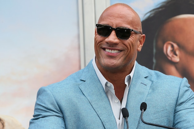 HOLLYWOOD, CALIFORNIA - DECEMBER 10: Dwayne Johnson attends a Hand and Footprint ceremony honoring Kevin Hart at the TCL Chinese Theatre IMAX on December 10, 2019 in Hollywood, California. (Photo by Jean Baptiste Lacroix/Getty Images) HOLLYWOOD, CALIFORNIA - DECEMBER 10: Dwayne Johnson attends a Hand and Footprint ceremony honoring Kevin Hart at the TCL Chinese Theatre IMAX on December 10, 2019 in Hollywood, California. (Photo by Jean Baptiste Lacroix/Getty Images)