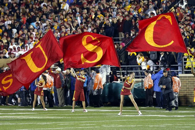 CHESTNUT HILL, MA - SEPTEMBER 13:  The USC cheerleaders wave flags before the game between the Boston College Eagles and the USC Trojans on September 13, 2014 at Alumni Stadium in Chestnut Hill, Massachusetts.  (Photo by Winslow Townson/Getty Images)