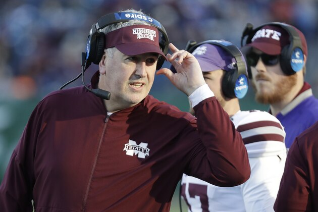 FILE - In this Dec. 30, 2019, file photo, Mississippi State head coach Joe Moorhead watches from the sideline in the first half of the Music City Bowl NCAA college football game against Louisville, in Nashville, Tenn.  Two people with knowledge of the situation say Mississippi State has fired coach Joe Moorhead after just two seasons. They spoke to The Associated Press on condition of anonymity because an announcement had not yet been made by the school. A meeting was scheduled Friday, Jan. 3, 2020, with Moorhead and athletic director John Cohen. (AP Photo/Mark Humphrey, File)