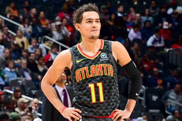 ATLANTA, GA - JANUARY 14: Trae Young #11 of the Atlanta Hawks looks on during the game against the Phoenix Suns on January 14, 2020 at State Farm Arena in Atlanta, Georgia.  NOTE TO USER: User expressly acknowledges and agrees that, by downloading and/or using this Photograph, user is consenting to the terms and conditions of the Getty Images License Agreement. Mandatory Copyright Notice: Copyright 2020 NBAE (Photo by Scott Cunningham/NBAE via Getty Images)