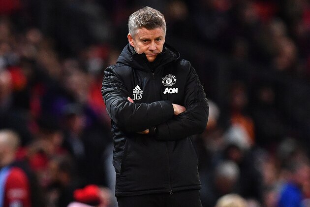 Manchester United's Norwegian manager Ole Gunnar Solskjaer reacts during the English League Cup semi-final first leg football match between Manchester United and Manchester City at Old Trafford in Manchester, north west England on January 7, 2020. - Manchester City won the match 3-1. (Photo by Paul ELLIS / AFP) / RESTRICTED TO EDITORIAL USE. No use with unauthorized audio, video, data, fixture lists, club/league logos or 'live' services. Online in-match use limited to 75 images, no video emulation. No use in betting, games or single club/league/player publications. /  (Photo by PAUL ELLIS/AFP via Getty Images)