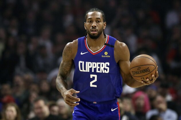 Los Angeles Clippers' Kawhi Leonard dribbles during an NBA basketball game against the Memphis Grizzlies Saturday, Jan. 4, 2020, in Los Angeles. (AP Photo/Marcio Jose Sanchez)