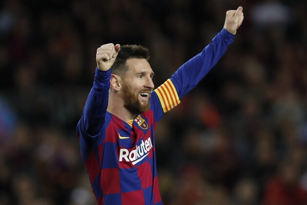 Barcelona's Lionel Messi celebrates after his team scored his side's fourth goal during a Spanish La Liga soccer match between Barcelona and Celta at Camp Nou stadium in Barcelona, Saturday, Nov. 9, 2019. (AP Photo/Joan Monfort)