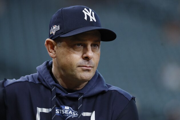 New York Yankees manager Aaron Boone watches batting practice before Game 6 of baseball's American League Championship Series against the Houston Astros Saturday, Oct. 19, 2019, in Houston. (AP Photo/Matt Slocum) New York Yankees manager Aaron Boone watches batting practice before Game 6 of baseball's American League Championship Series against the Houston Astros Saturday, Oct. 19, 2019, in Houston. (AP Photo/Matt Slocum)
