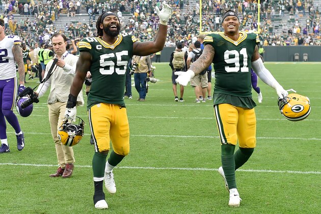 GREEN BAY, WISCONSIN - SEPTEMBER 15: Za'Darius Smith #55 and Preston Smith #91 of the Green Bay Packers celebrate after the game against the Minnesota Vikings at Lambeau Field on September 15, 2019 in Green Bay, Wisconsin. (Photo by Quinn Harris/Getty Images)