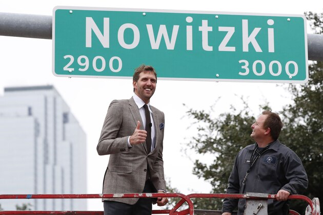 Former Dallas Mavericks and NBA basketball player Dirk Nowitzki, of Germany, gives a thumbs-up after unveiling a sign for a street named after him in Dallas, Wednesday, Oct. 30, 2019.  (AP Photo/LM Otero)