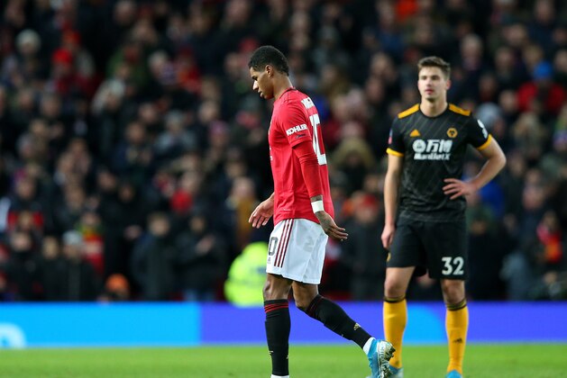 MANCHESTER, ENGLAND - JANUARY 15:  Marcus Rashford of Manchester United  walks off injured during the FA Cup Third Round Replay match between Manchester United and Wolverhampton Wanderers at Old Trafford on January 15, 2020 in Manchester, England. (Photo by Alex Livesey/Getty Images)