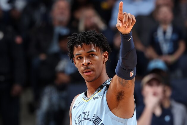 MEMPHIS, TN - JANUARY 14: Ja Morant #12 of the Memphis Grizzlies signals to a a teammate during the game against the Houston Rockets on January 14, 2020 at FedExForum in Memphis, Tennessee. NOTE TO USER: User expressly acknowledges and agrees that, by downloading and or using this photograph, User is consenting to the terms and conditions of the Getty Images License Agreement. Mandatory Copyright Notice: Copyright 2020 NBAE (Photo by Joe Murphy/NBAE via Getty Images)