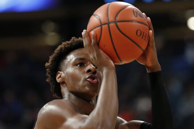 Sierra Canyon's Bronny James shoots a free throw against Akron St. Vincent - St. Mary during the second half of a high school basketball game, Saturday, Dec. 14, 2019, in Columbus, Ohio. (AP Photo/Jay LaPrete)