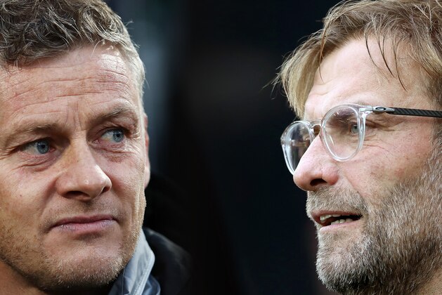 FILE PHOTO (EDITORS NOTE: COMPOSITE OF IMAGES - Image numbers 1178800802,856402376 - GRADIENT ADDED) In this composite image a comparison has been made between Ole Gunnar Solskjaer, Manager of Manchester United  (L) and Liverpool manager Jurgen Klopp. Manchester United and Liverpool FC meet in the Premier League fixture on October 18, 2019 at Old Trafford in Manchester.  ***LEFT IMAGE*** THE HAGUE, NETHERLANDS - OCTOBER 03: Ole Gunnar Solskjaer, Manager of Manchester United looks on prior to the UEFA Europa League group L match between AZ Alkmaar and Manchester United at ADO Den Haag on October 03, 2019 in The Hague, Netherlands. (Photo by Bryn Lennon/Getty Images) ***RIGHT IMAGE*** NEWCASTLE UPON TYNE, ENGLAND - OCTOBER 01: Liverpool manager Jurgen Klopp looks on during the Premier League match between Newcastle United and Liverpool at St. James Park on October 1, 2017 in Newcastle upon Tyne, England. (Photo by Ian MacNicol/Getty Images)