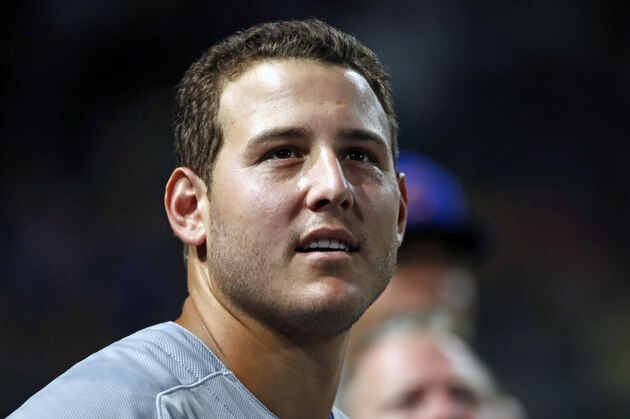 Chicago Cubs' Anthony Rizzo stands in the dugout during a baseball game Pittsburgh Pirates in Pittsburgh, Monday, July 1, 2019. (AP Photo/Gene J. Puskar)