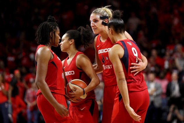WASHINGTON, DC - OCTOBER 10: Elena Delle Donne #11 talks with Natasha Cloud #9 of Washington Mystics during the second half against the Connecticut Sun during Game Five of the 2019 WNBA Finals at St Elizabeths East Entertainment & Sports Arena on October 10, 2019 in Washington, DC. (Photo by Rob Carr/Getty Images)