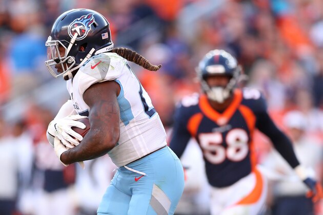 DENVER, COLORADO - OCTOBER 13: Derrick Henry #22 of the Tennessee Titans carries the ball against the Denver Broncos in the third quarter at Broncos Stadium at Mile High on October 13, 2019 in Denver, Colorado. (Photo by Matthew Stockman/Getty Images)