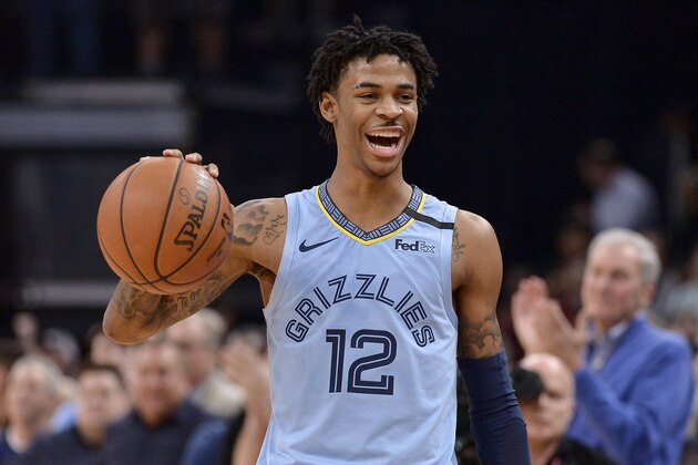 Memphis Grizzlies guard Ja Morant reacts while the Grizzlies run out the clock in an NBA basketball game against the Houston Rockets on Tuesday, Jan. 14, 2020, in Memphis, Tenn. (AP Photo/Brandon Dill) Memphis Grizzlies guard Ja Morant reacts while the Grizzlies run out the clock in an NBA basketball game against the Houston Rockets on Tuesday, Jan. 14, 2020, in Memphis, Tenn. (AP Photo/Brandon Dill)