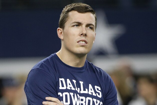 Dallas Cowboys offensive coordinator Kellen Moore watches team warmups before an NFL football game against the Buffalo Bills in Arlington, Texas, Thursday, Nov. 28, 2019. (AP Photo/Ron Jenkins)