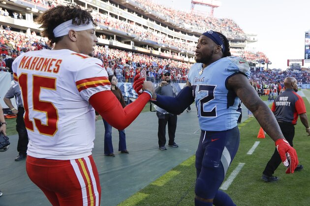 Kansas City Chiefs quarterback Patrick Mahomes (15) shakes hands with Tennessee Titans running back Derrick Henry (22) after an NFL football game Sunday, Nov. 10, 2019, in Nashville, Tenn. The Titans won 35-32. (AP Photo/James Kenney)