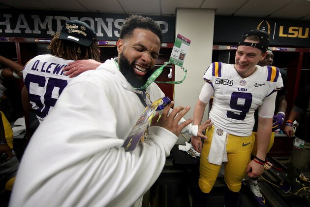 NEW ORLEANS, LOUISIANA - JANUARY 13: Odell Beckham Jr.  celebrates in the locker room with Joe Burrow #9 of the LSU Tigers after their 42-25 win over Clemson Tigers in the College Football Playoff National Championship game at Mercedes Benz Superdome on January 13, 2020 in New Orleans, Louisiana. (Photo by Chris Graythen/Getty Images)