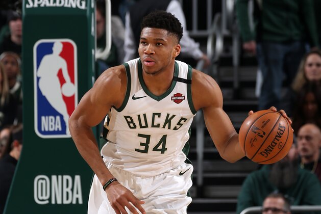 MILWAUKEE, WI - JANUARY 16: Giannis Antetokounmpo #34 of the Milwaukee Bucks handles the ball against the Boston Celtics on January 16, 2020 at the Fiserv Forum Center in Milwaukee, Wisconsin. NOTE TO USER: User expressly acknowledges and agrees that, by downloading and or using this Photograph, user is consenting to the terms and conditions of the Getty Images License Agreement. Mandatory Copyright Notice: Copyright 2020 NBAE (Photo by Gary Dineen/NBAE via Getty Images).