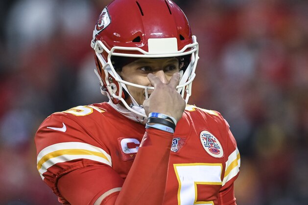 Kansas City Chiefs quarterback Patrick Mahomes (15) motions to a teammate during their game against the Houston Texans in an NFL football game in Kansas City, Mo., Sunday, Jan. 12, 2020. (AP Photo/Reed Hoffmann)