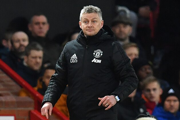 Manchester United's Norwegian manager Ole Gunnar Solskjaer reacts during the English FA Cup third round-replay football match between Manchester United and Wolverhampton Wanderers at Old Trafford in Manchester, north west England, on January 15, 2020. (Photo by Paul ELLIS / AFP) / RESTRICTED TO EDITORIAL USE. No use with unauthorized audio, video, data, fixture lists, club/league logos or 'live' services. Online in-match use limited to 120 images. An additional 40 images may be used in extra time. No video emulation. Social media in-match use limited to 120 images. An additional 40 images may be used in extra time. No use in betting publications, games or single club/league/player publications. /  (Photo by PAUL ELLIS/AFP via Getty Images)