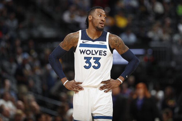 Minnesota Timberwolves forward Robert Covington (33) in the second half of an NBA basketball game Friday, Dec. 20, 2019, in Denver. The Nuggets won 109-100. (AP Photo/David Zalubowski) Minnesota Timberwolves forward Robert Covington (33) in the second half of an NBA basketball game Friday, Dec. 20, 2019, in Denver. The Nuggets won 109-100. (AP Photo/David Zalubowski)