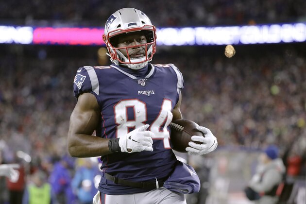 New England Patriots tight end Benjamin Watson runs after catching a pass in the second half of an NFL football game against the Buffalo Bills, Saturday, Dec. 21, 2019, in Foxborough, Mass. The play was nullified by a penalty. (AP Photo/Steven Senne)