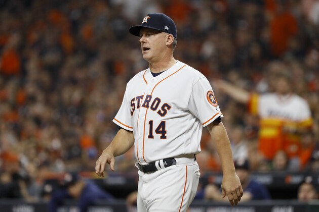 Houston Astros manager AJ Hinch protests a call during the fourth inning of Game 1 of the baseball World Series against the Washington Nationals Tuesday, Oct. 22, 2019, in Houston. (AP Photo/Matt Slocum)